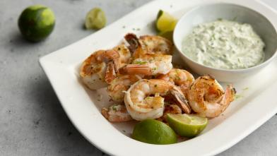 A plate of shrimp and creamy poblano sauce for a protein rich diabetic diet