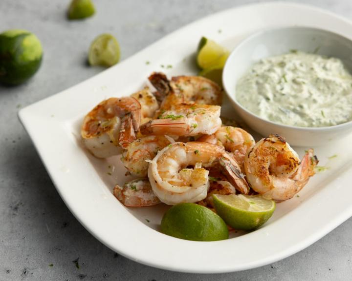 A plate of shrimp and creamy poblano sauce for a protein rich diabetic diet
