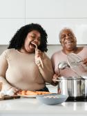 A family cooking healthy foods for a diabetic friendly diet
