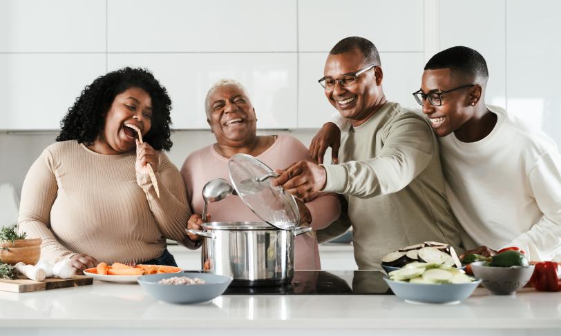 A family cooking healthy foods for a diabetic friendly diet