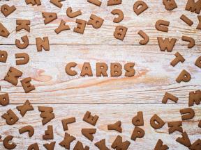 The word Carbs in wooden block letters