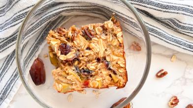 A Apple, Cranberry, and California Dates Oatmeal Bake bar slice for a diabetic friendly diet