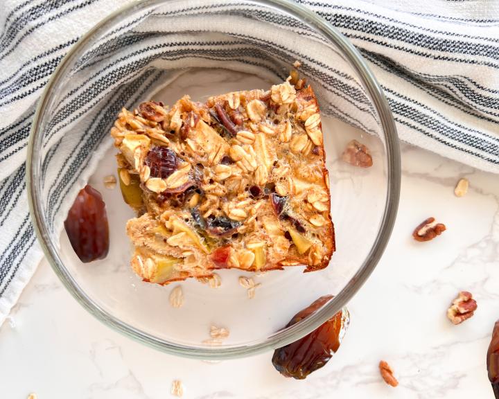 A Apple, Cranberry, and California Dates Oatmeal Bake bar slice for a diabetic friendly diet