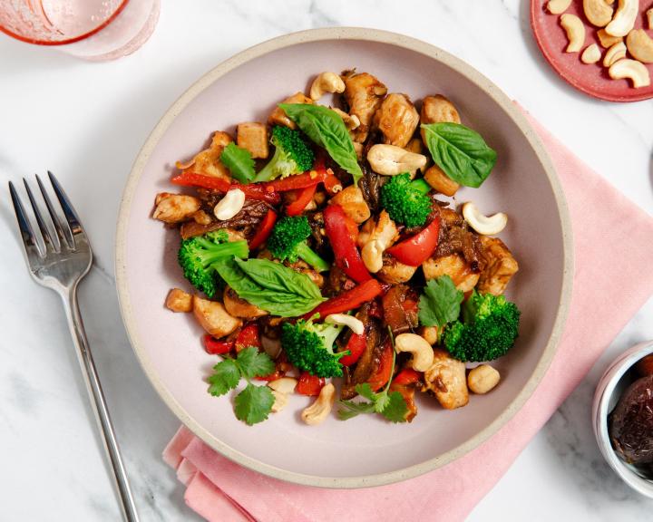 A bowl of Date & Cashew Chicken Stir Fry for a diabetes friendly healthy meal